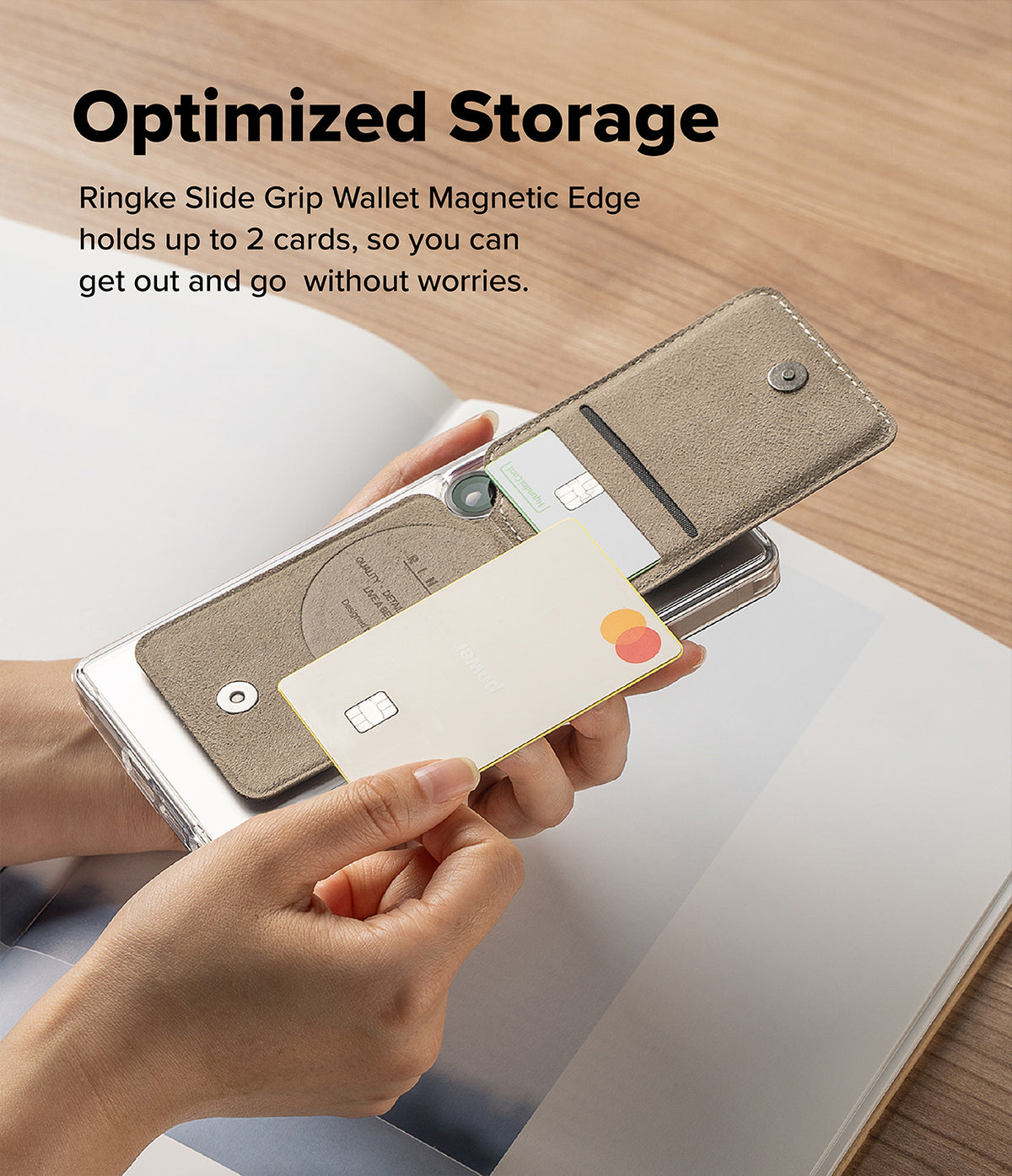 Card Holder | Slide Grip Wallet Magnetic Edge - Hands holding a phone case with a magnetic wallet storing two cards.
