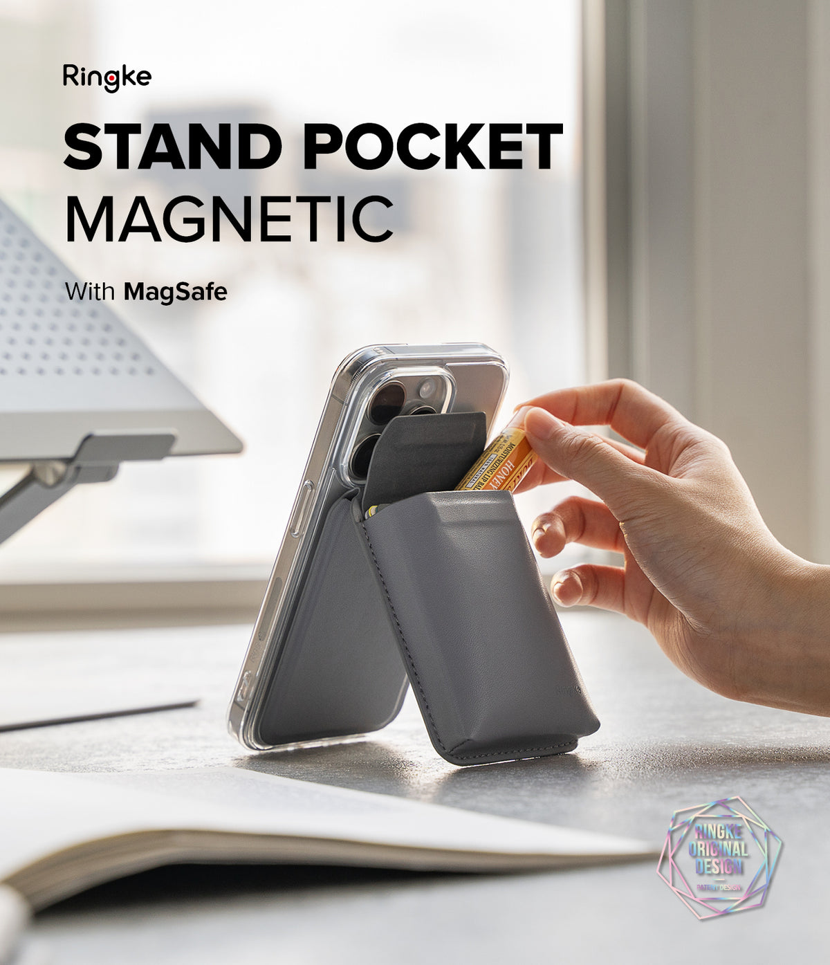 Card Holder | Stand Pocket Magnetic - A grey magnetic phone wallet acting as a stand, with a hand inserting a lip balm.