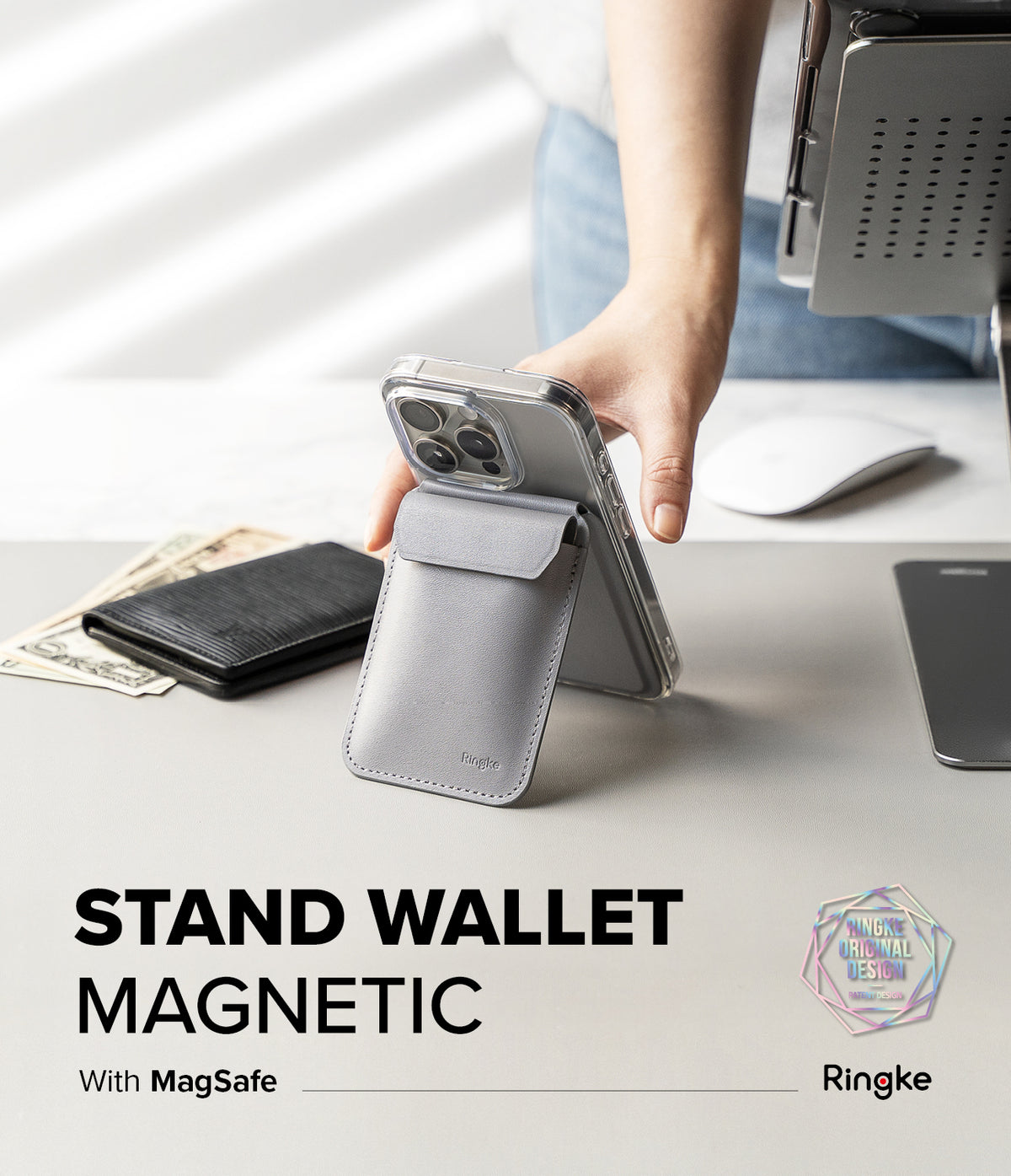 Card Holder | Stand Wallet Magnetic - A grey magnetic wallet attached to a phone, propped up as a stand on a desk.