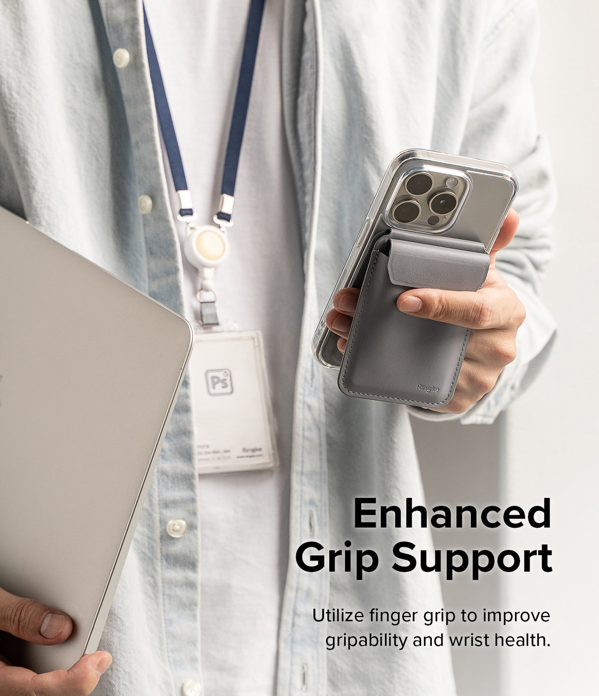 Card Holder | Stand Wallet Magnetic - Person holding a phone with a grey magnetic wallet attached, providing a finger grip.