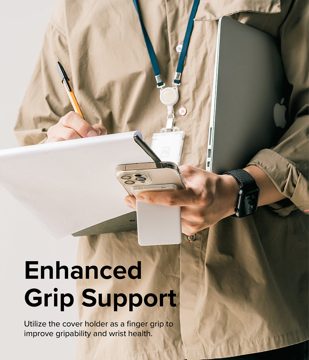 Card Holder | Stand Slot - Person holding a phone with a white card holder grip attached while writing on a notepad.