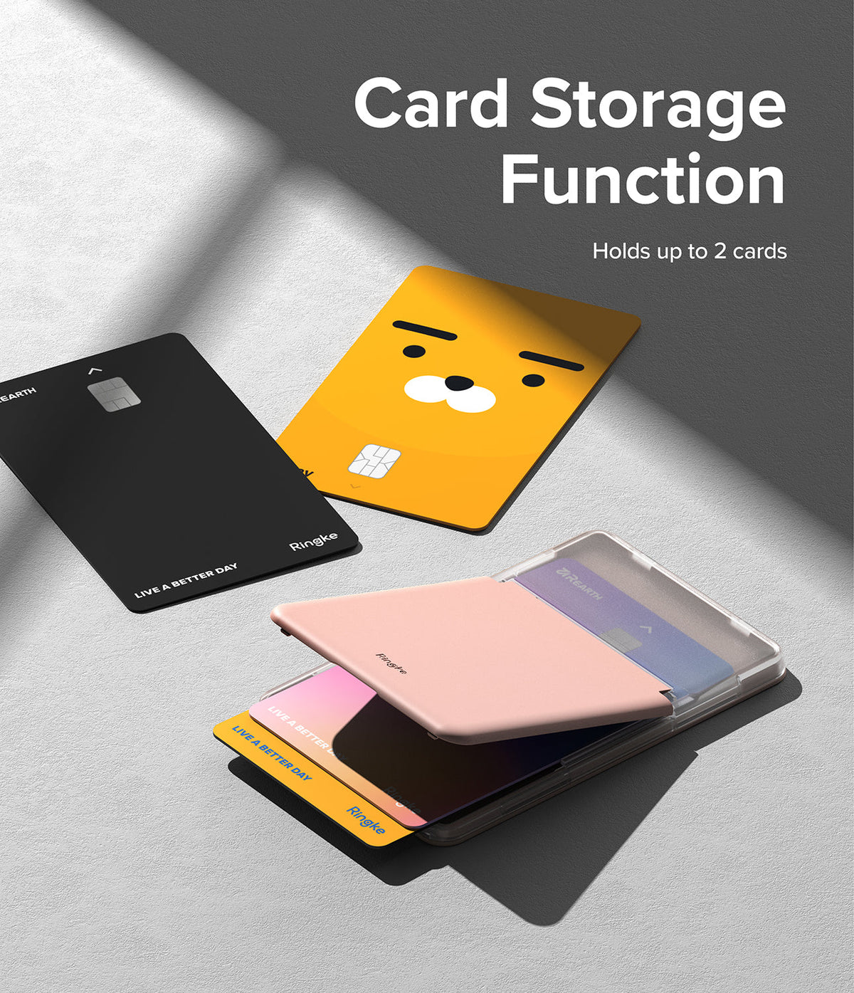 Card Holder | Stand Slot - A pink card holder stand holding two cards, with additional black and yellow character cards nearby.