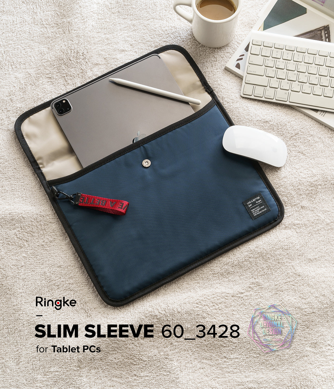 Pad Pouch | Slim Sleeve - Navy blue tablet sleeve with a tablet, stylus, and mouse on a textured surface.
