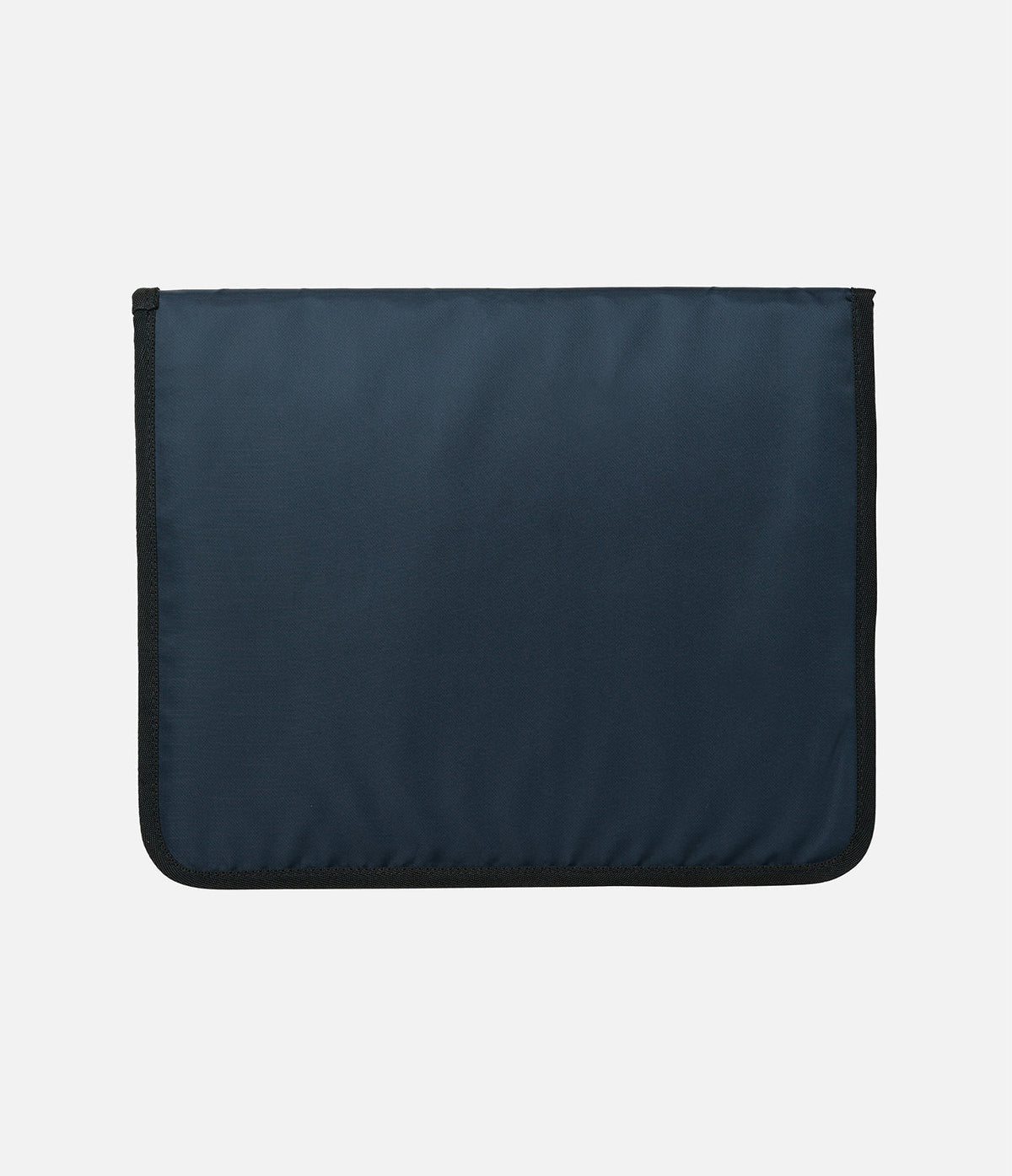 Pad Pouch | Slim Sleeve - A rectangular navy blue protective sleeve with black fabric trim on a light gray background.