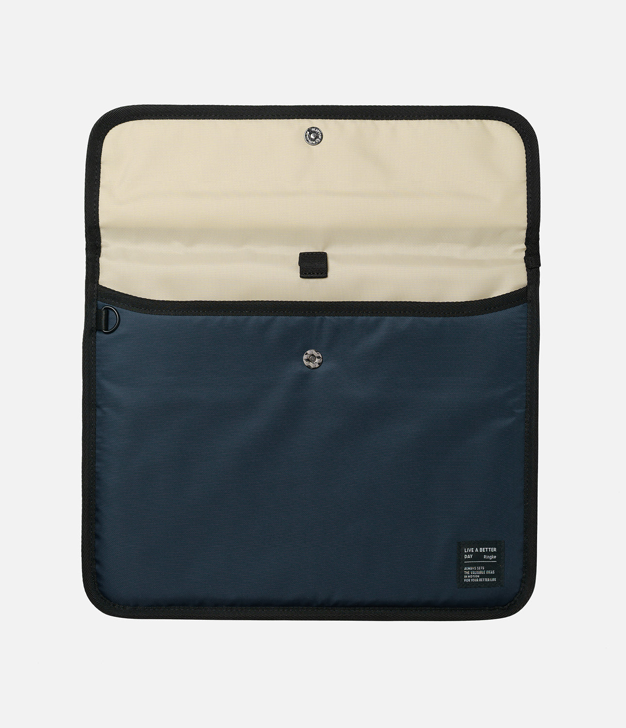Pad Pouch | Slim Sleeve - Open navy blue tablet sleeve with a beige interior, snap button closure, and small brand label.