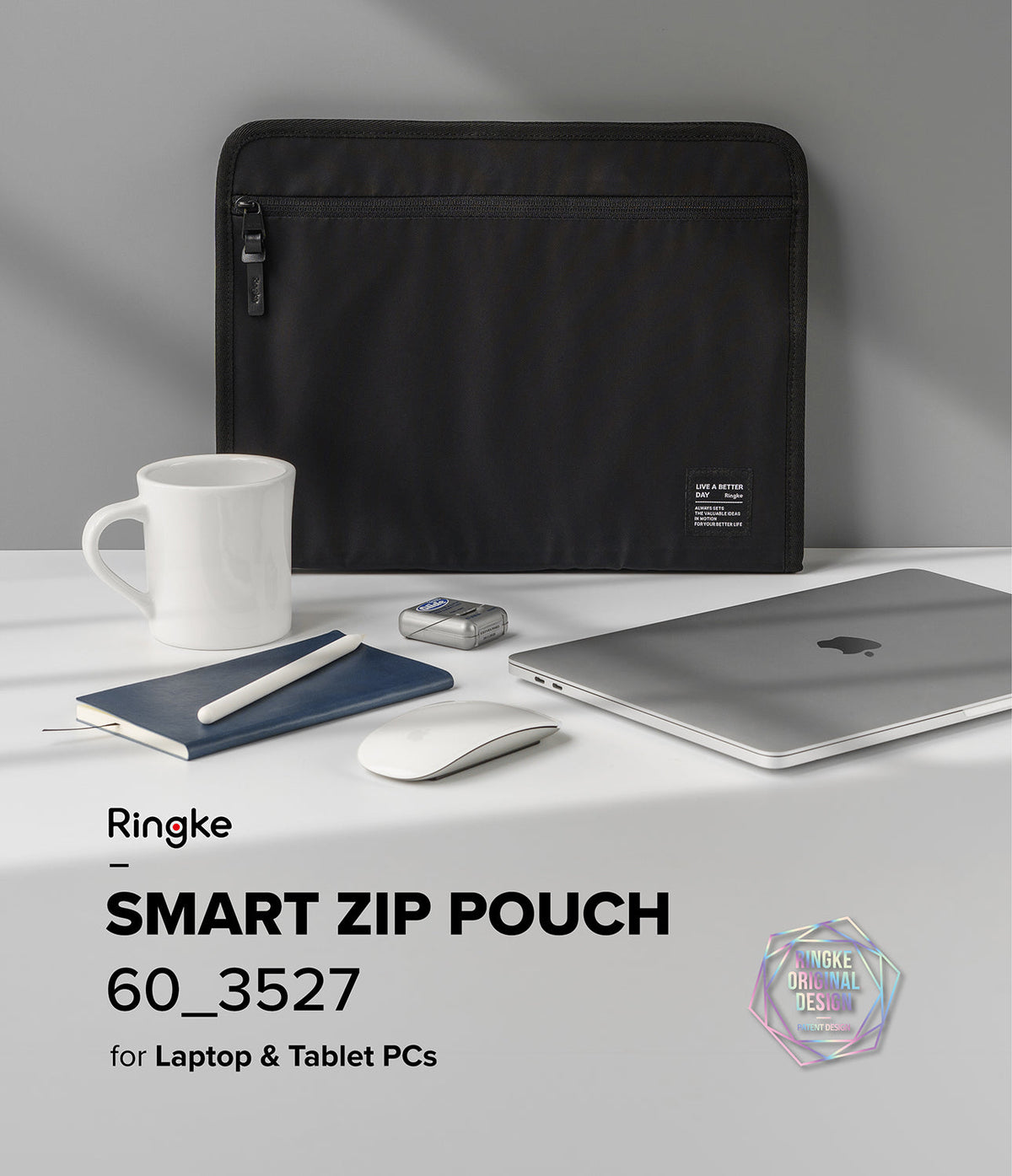 Pad Pouch | Smart Zip Pouch - Black zippered laptop sleeve with a mug, notebook, mouse, and laptop on a white desk.