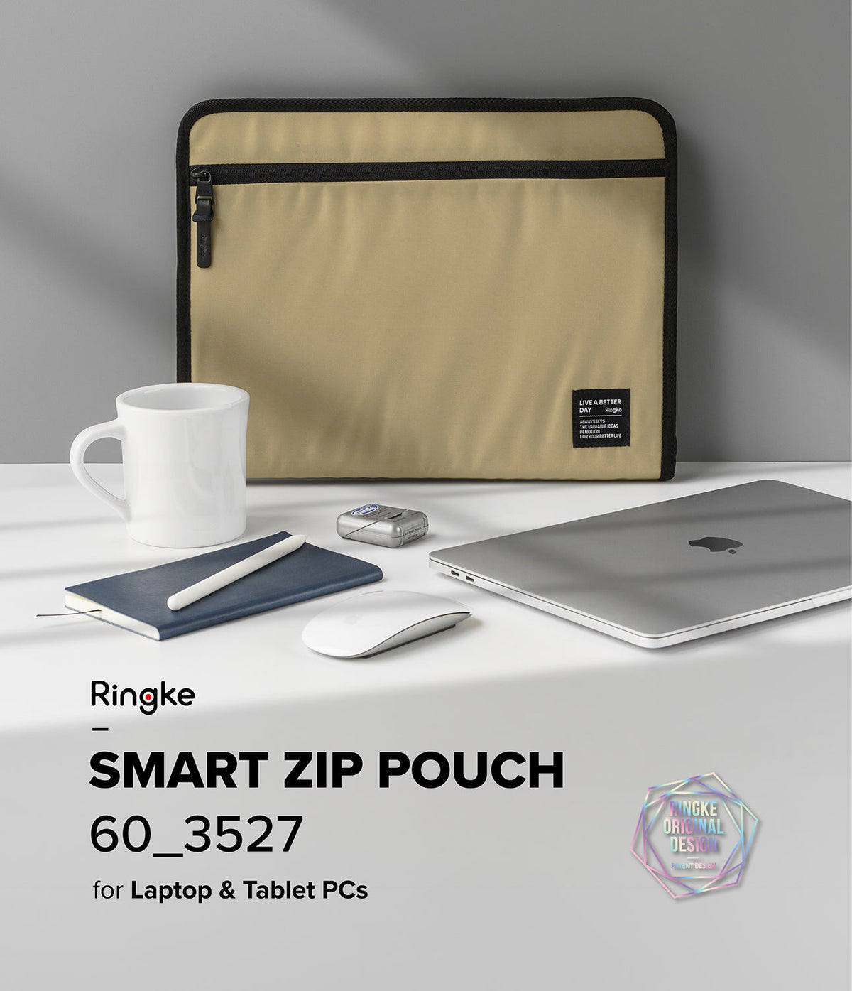Pad Pouch | Smart Zip Pouch - Tan zippered laptop sleeve with a mug, notebook, mouse, and laptop on a white desk.