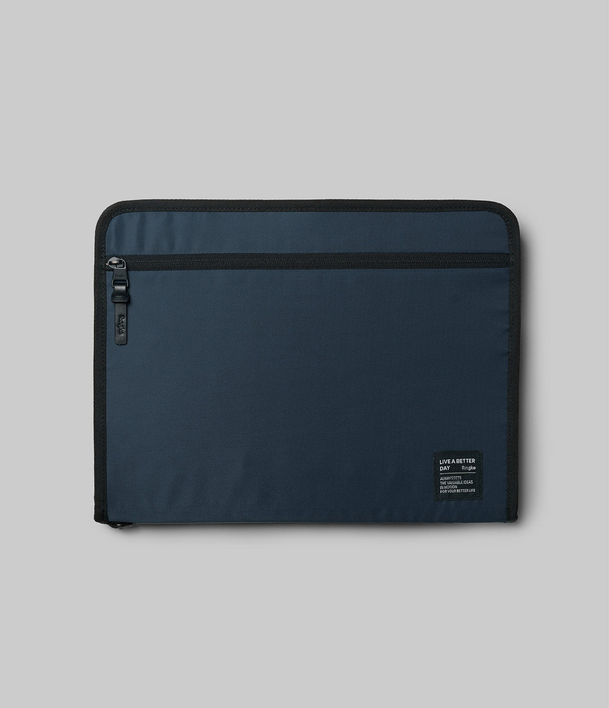 Pad Pouch | Smart Zip Pouch - Navy blue rectangular zippered pouch with a black logo patch and side zipper pull.