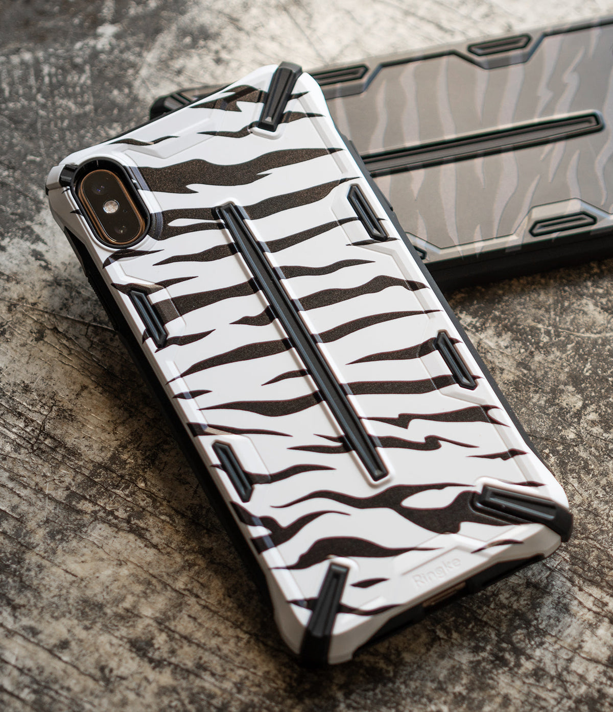 iPhone XS Max Case | Dual-X Design - White and black zebra-patterned rugged phone case with raised black accents.