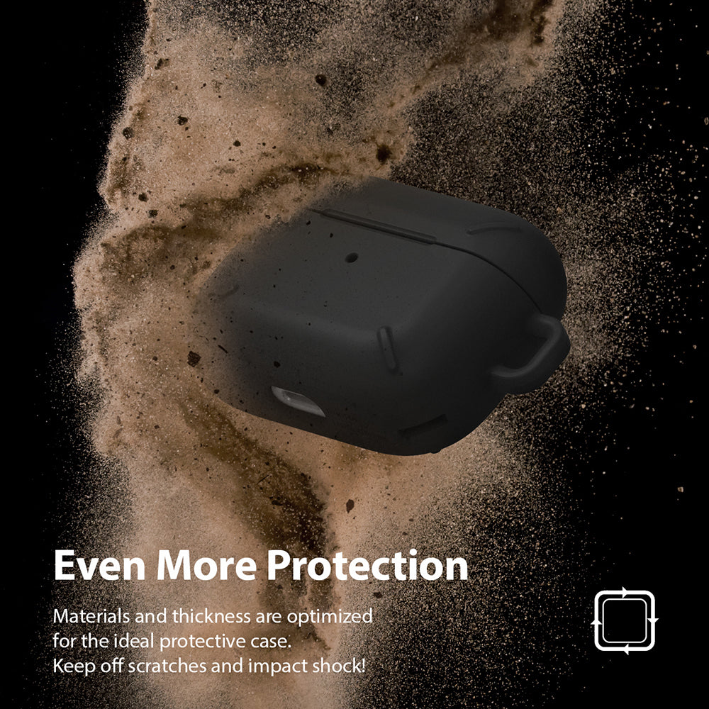 AirPods Pro Case - Black - Matte black protective case surrounded by a cloud of dust against a black background.