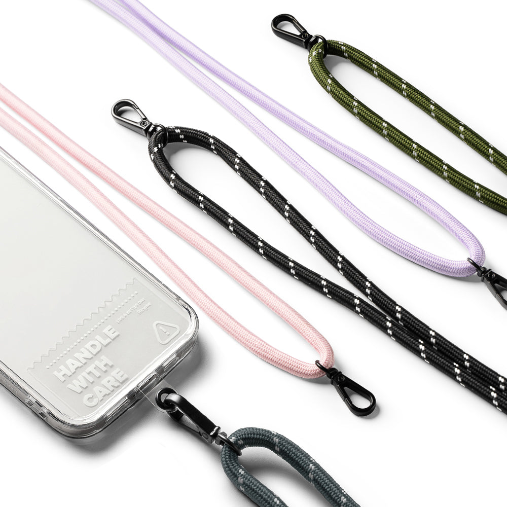 Holder Link Strap | Clear - A clear phone case with Handle With Care text next to several colorful, reflective rope lanyards.