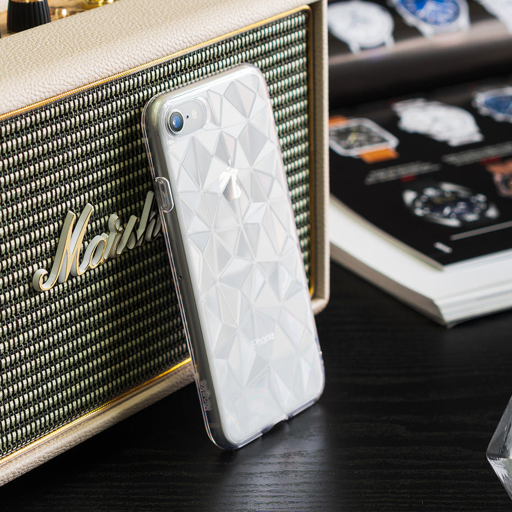 iPhone 8 / 7 Case | Air Prism - Clear phone case with a geometric prism pattern leaning against a vintage-style speaker.