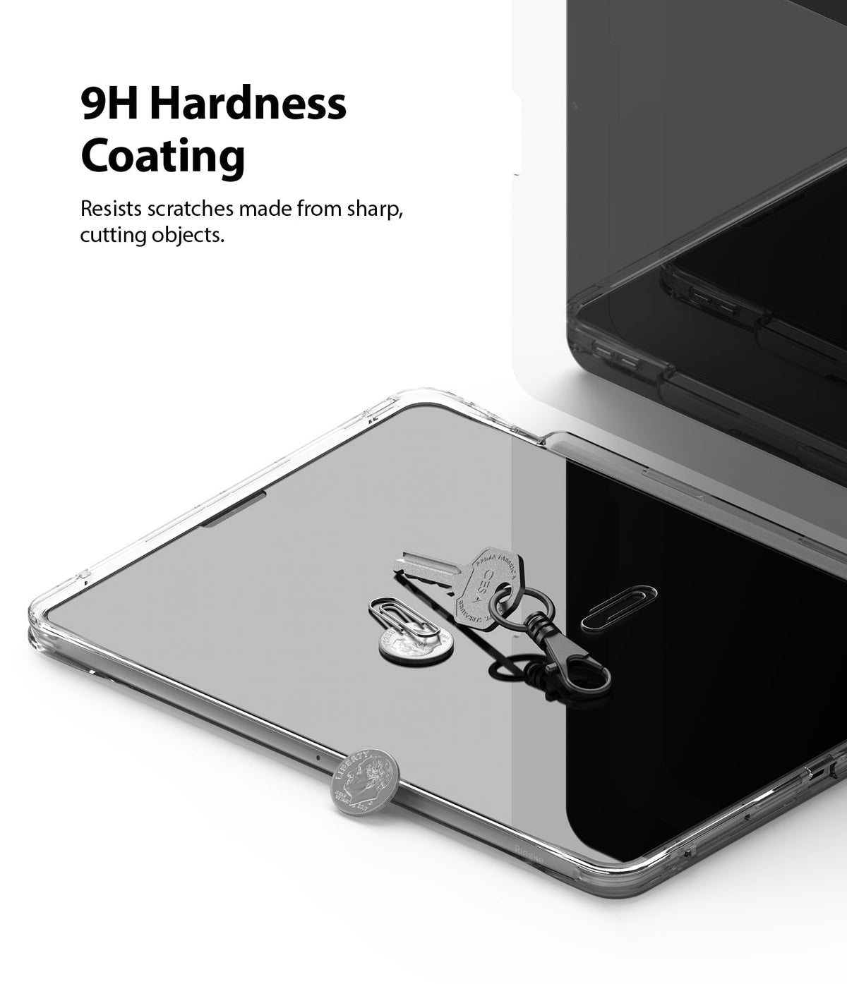 Invisible Defender Glass | iPad - Keys and coins resting on an iPad screen protected by 9H hardness glass.