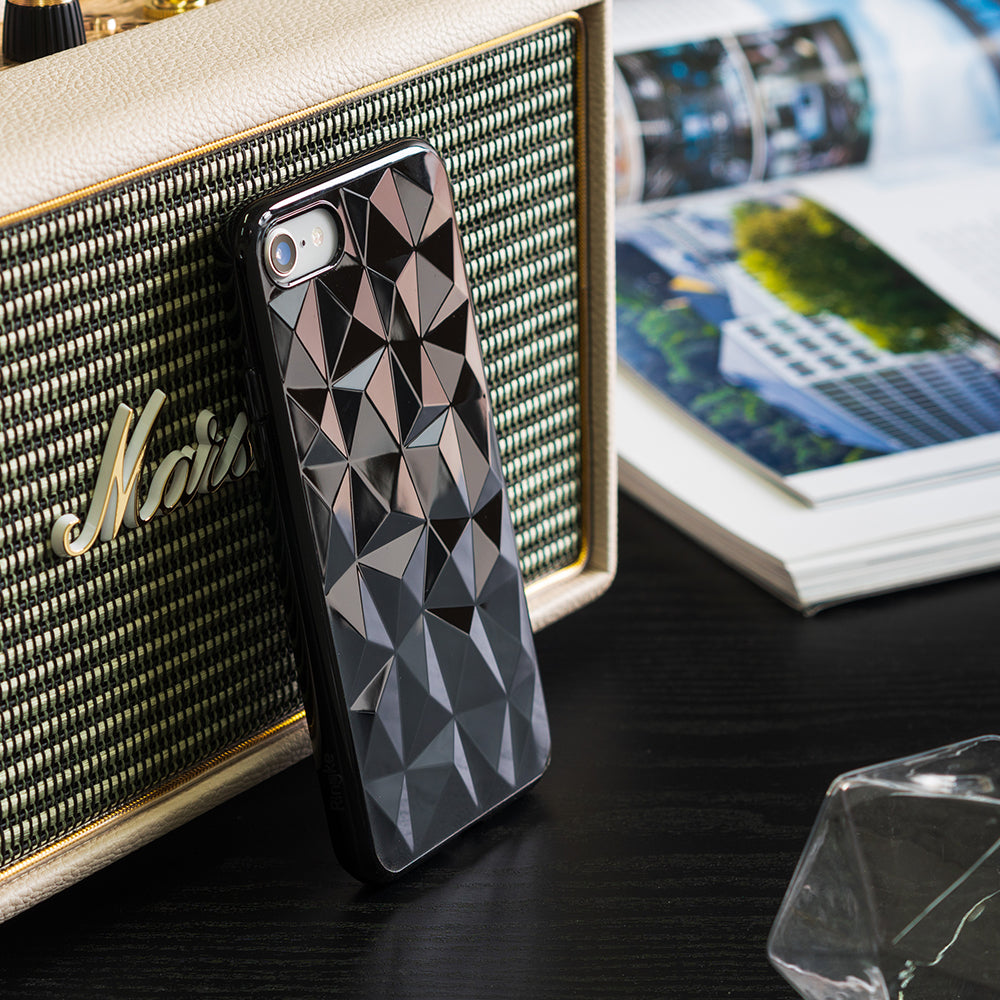 iPhone 8 / 7 Case | Air Prism - Black geometric prism-patterned phone case leaning against a vintage-style speaker.