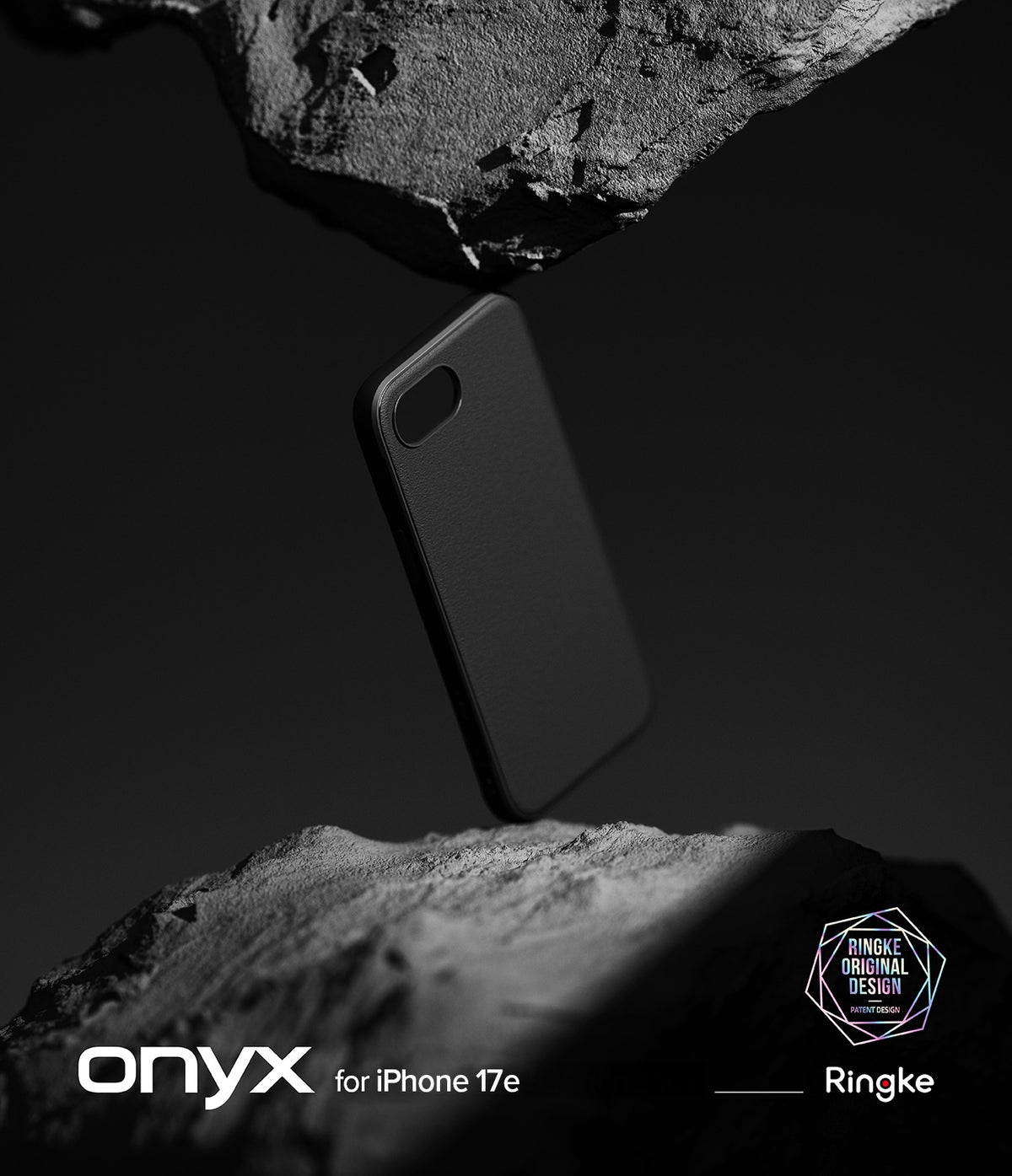 iPhone 17e Case | Onyx - A black phone case suspended between two rough, dark stone surfaces against a moody background.