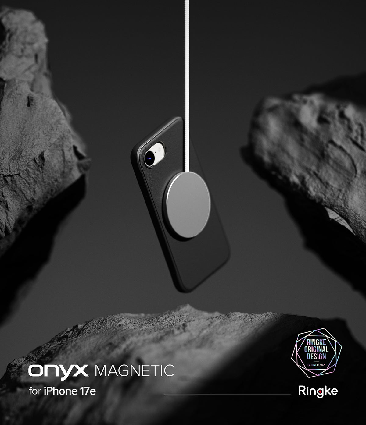 iPhone 17e Case | Onyx Magnetic - Black phone case suspended by a magnetic charger between dark, jagged rocks.