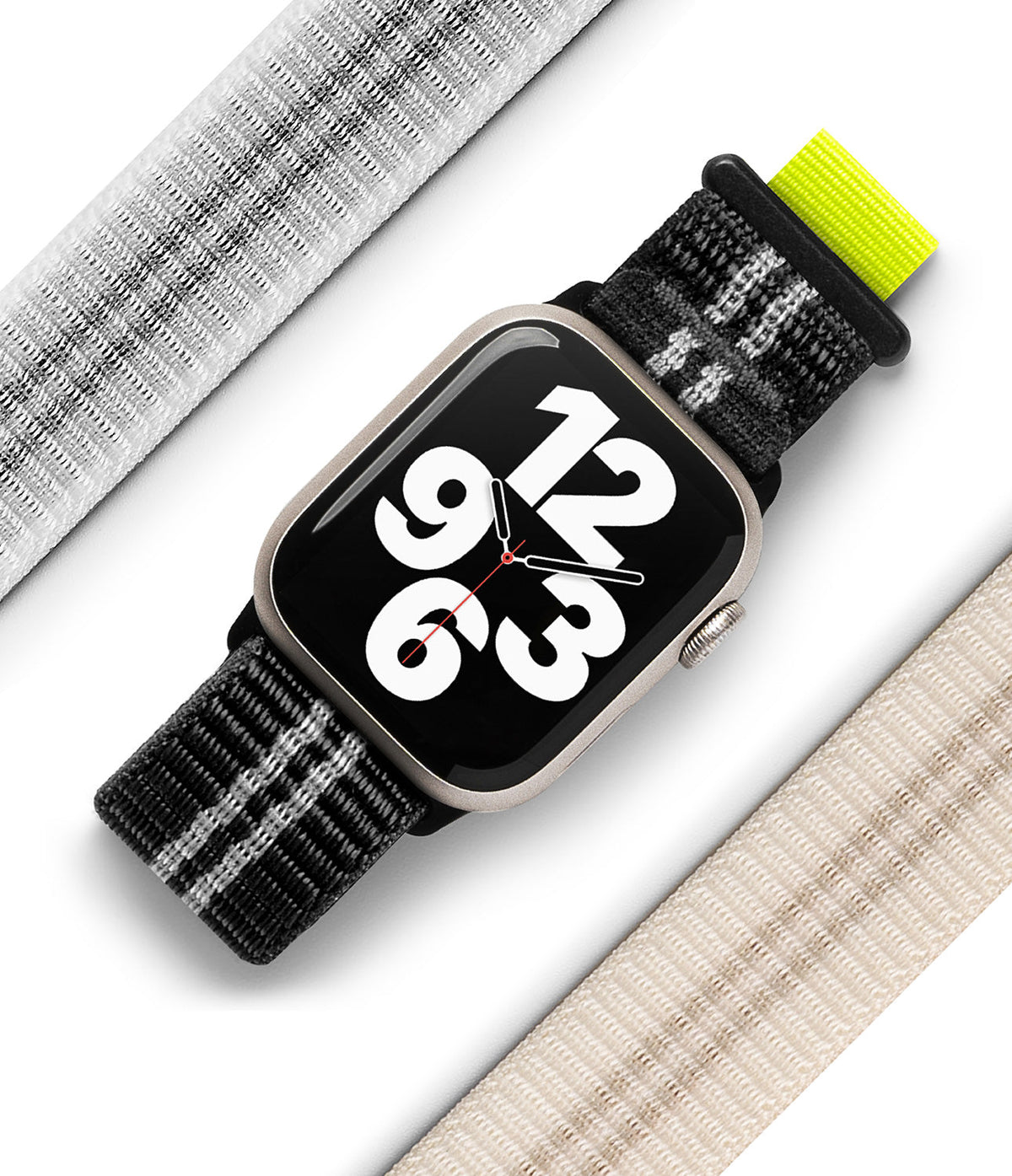 Apple Watch 42·41·40·38 mm | Sports Air Loop - Apple Watch with black patterned strap and neon tab, flanked by two neutral-colored fabric bands.