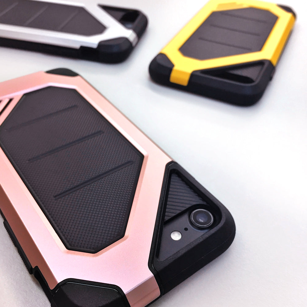 iPhone 8 / 7 Case | Max - Three rugged, dual-tone protective phone cases in rose gold, yellow, and white on a white surface.