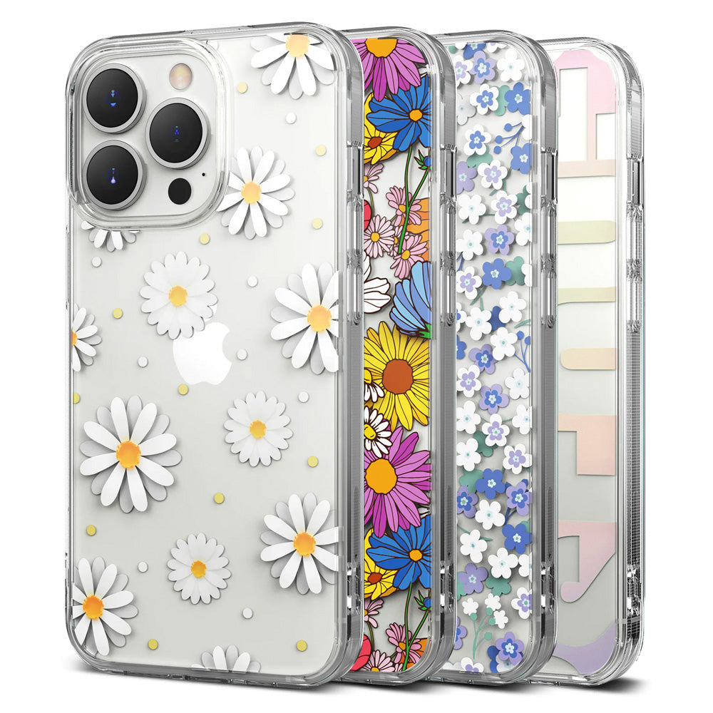 iPhone 13 Pro Case | Fusion Design - Three clear phone cases featuring various floral patterns and a pastel letter design.