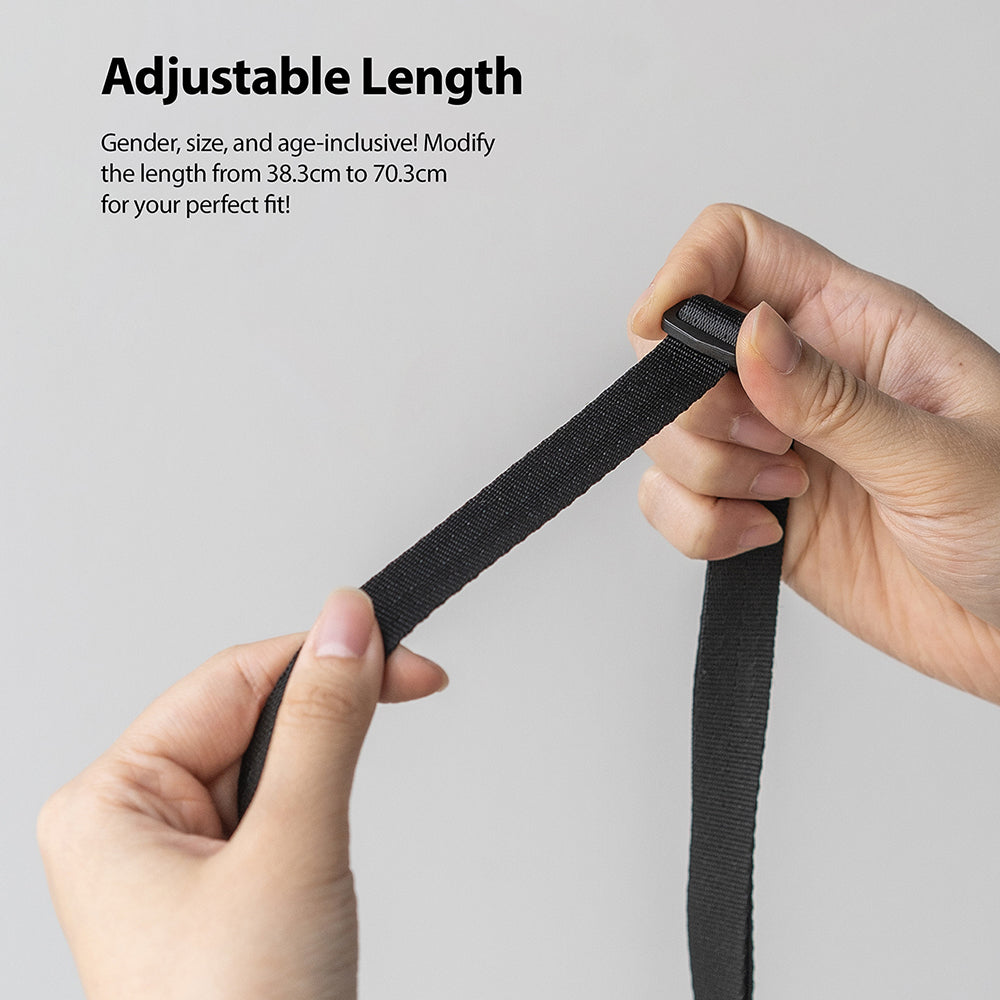 Lanyard Strap | Black - Hands adjusting the length of a black fabric lanyard strap using a sliding plastic buckle.