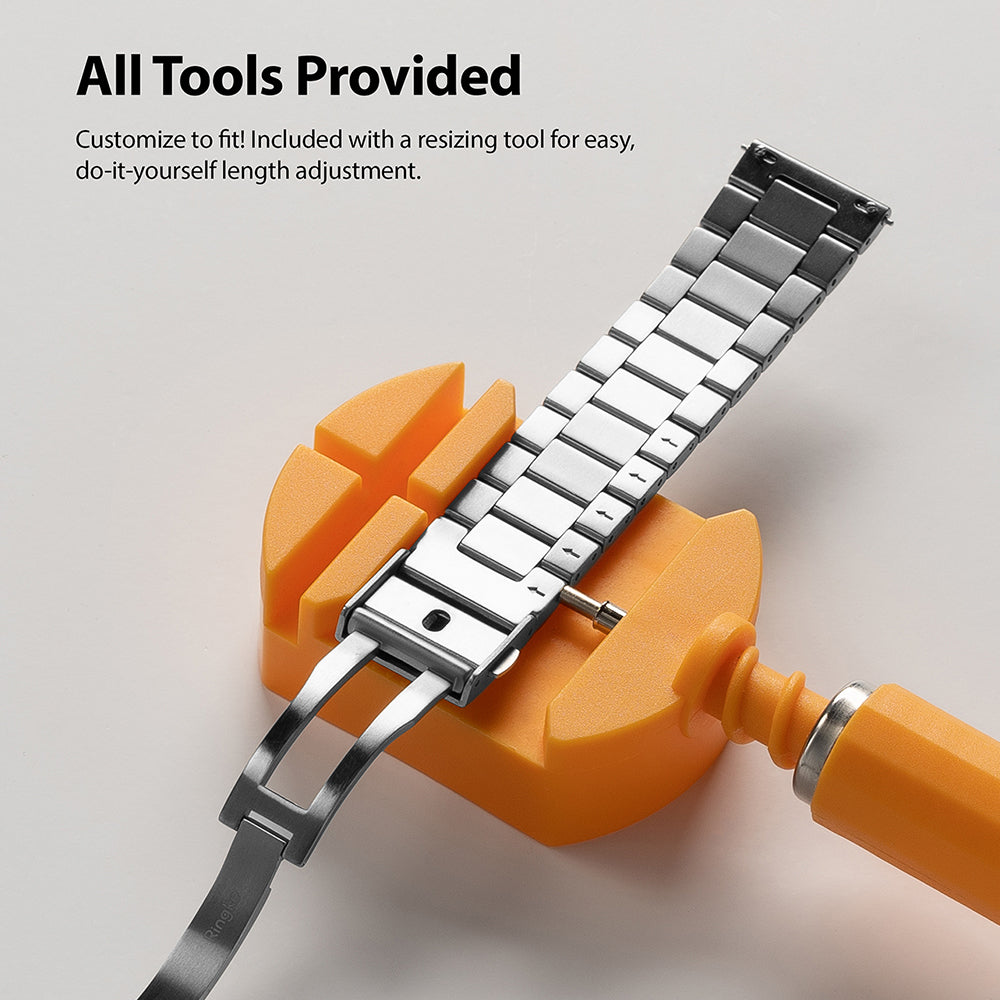 Watch Lug 22mm | Metal One Band α - Silver - Silver watch band being resized with an orange tool on a white background.