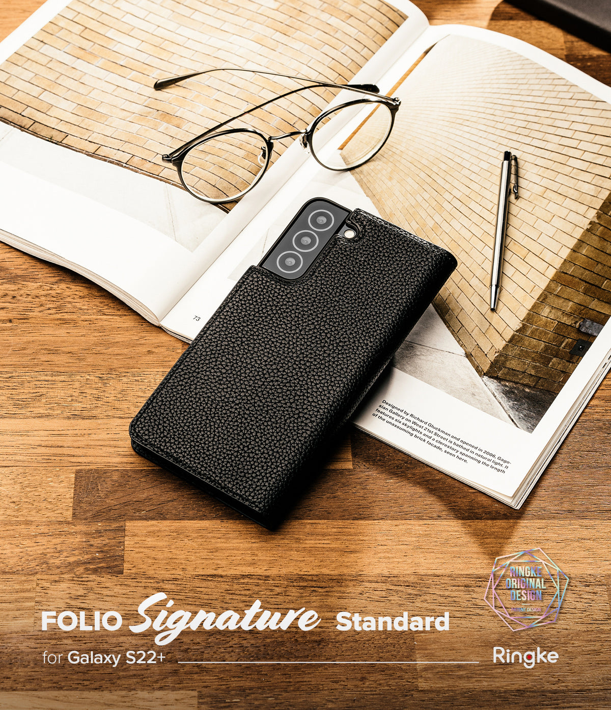 Galaxy S22 Plus Case | Folio Signature Standard - Black textured leather phone case on an open book with glasses and pen.