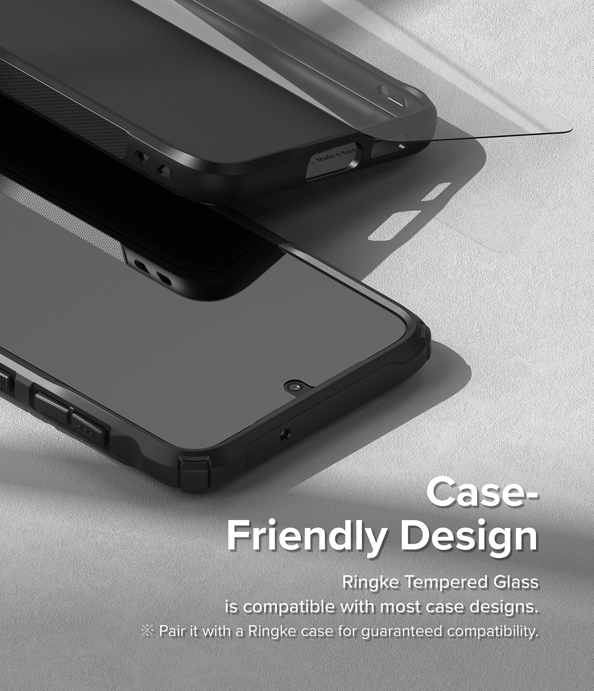 Galaxy S23 Screen Protector | Full Cover Glass - Tempered glass screen protector hovering above a phone in a protective case.
