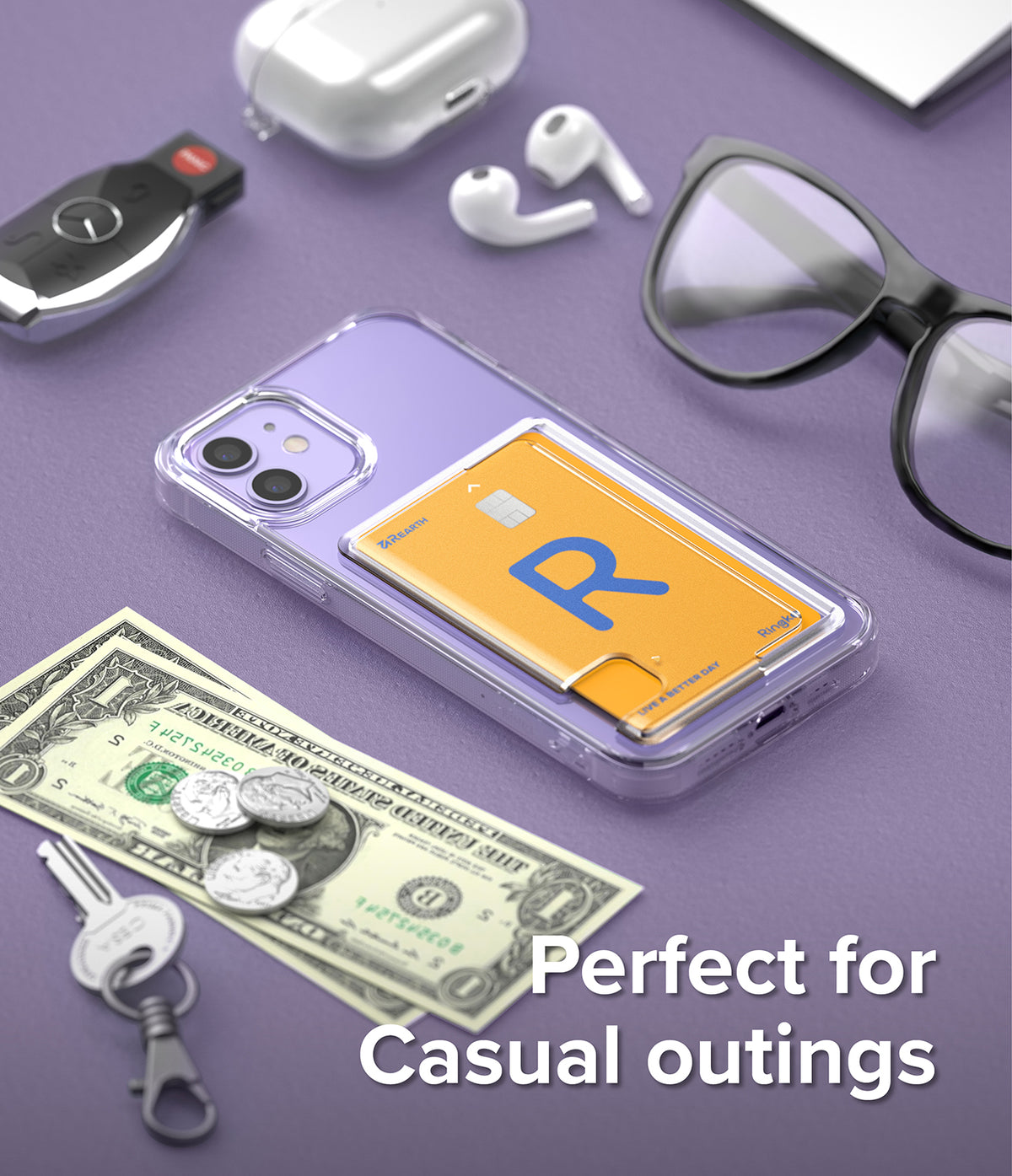iPhone 12 / 12 Pro Case | Fusion Card - Clear phone case with a yellow card holder on a purple surface with accessories.