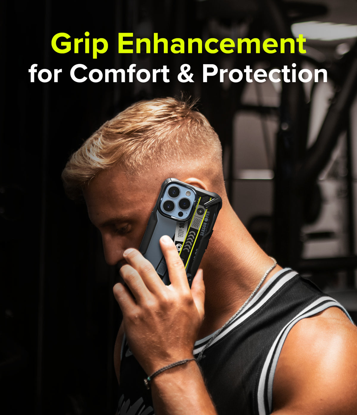 iPhone 13 Pro Case | Fusion-X Design - Ticket Band - Man in gym attire holding a phone with a black and yellow case.