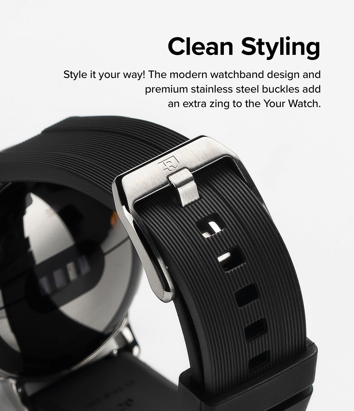 Google Pixel Watch | Rubber One Band - Close-up of a black ribbed rubber watch band with a brushed stainless steel buckle.