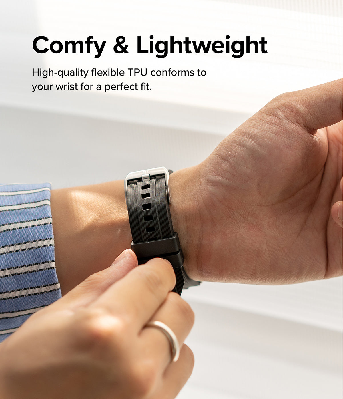 Google Pixel Watch | Rubber One Band - A person wearing a black ribbed TPU watch band on their wrist.
