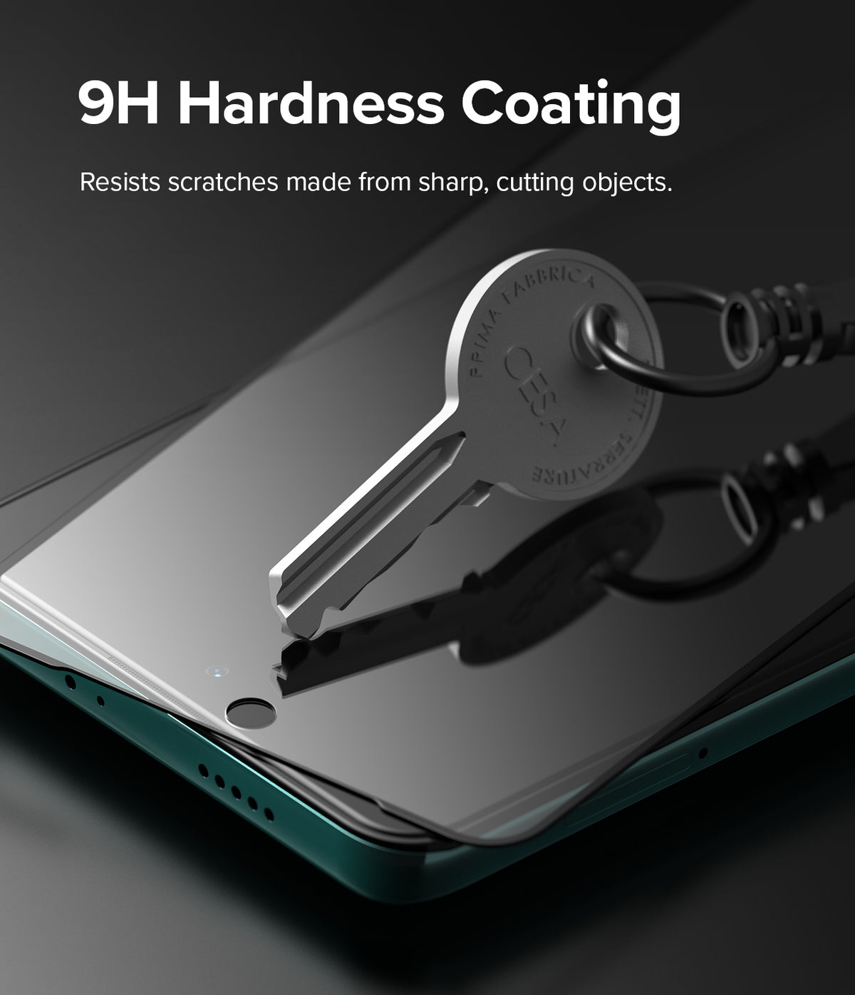 Redmi Note 11T 5G / Poco M4 Pro 5G Screen Protector | Invisible Defender - Redmi Note 11T 5G / Poco M4 Pro 5G Screen Protector - A metal key resting on a phone screen protector to show scratch resistance.
