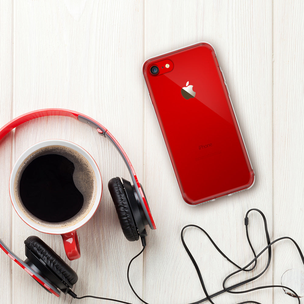 iPhone 8 / 7 Case | Fusion - Clear - Red iPhone in a clear case next to red headphones and a cup of coffee on a white wooden surface.