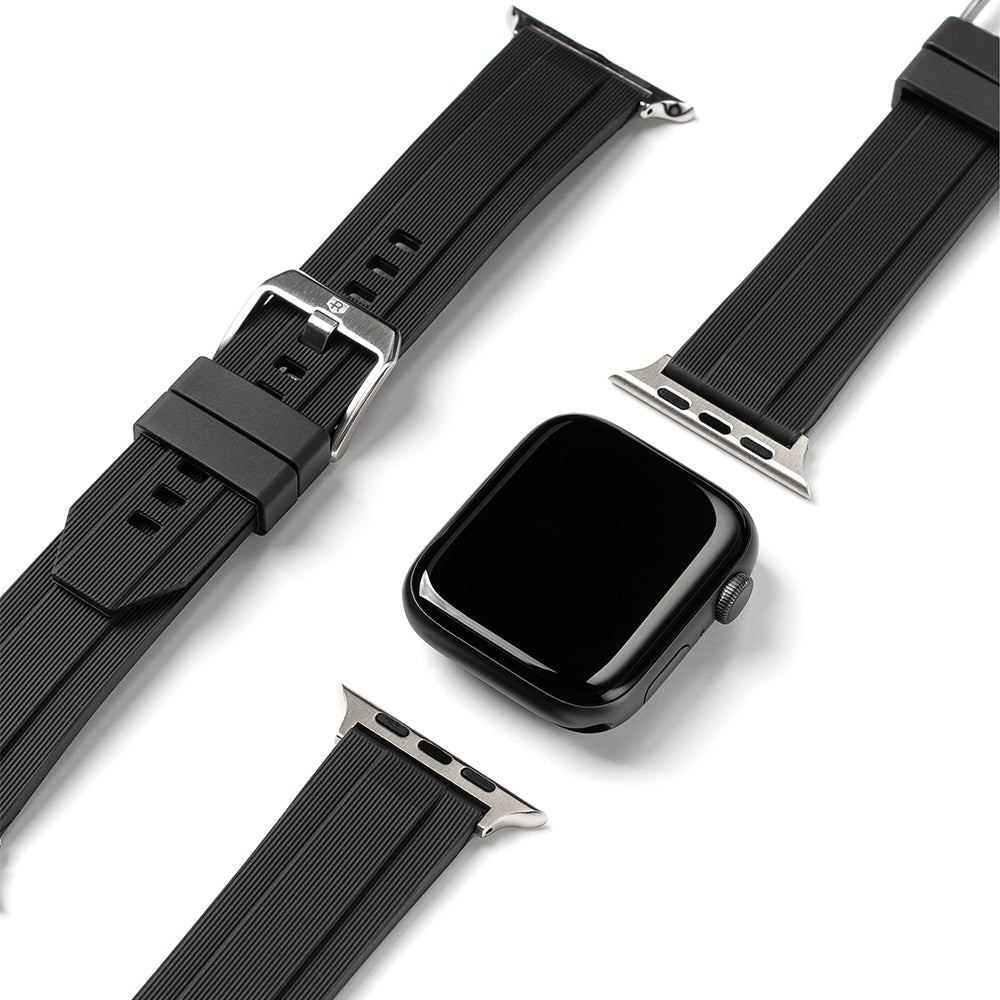 Apple Watch 49·46·45·44·42 mm | Rubber One Band - Black Apple Watch face with two detached ribbed rubber watch straps.