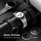 Galaxy Watch 4 Classic 42mm | Bezel Styling - Silver Galaxy Watch 4 with a black tachymeter bezel accessory attached.