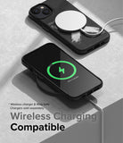 iPhone 14 Case | Onyx Design - Black iPhone 14 with Onyx design charging wirelessly with MagSafe and a charging pad.