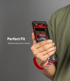 iPhone SE 2022 5G / SE 2020 / 8 Case | Fusion-X Design - Hand holding phone in red and black camo case with wrist strap.