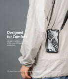 iPhone SE 2022 5G / SE 2020 / 8 Case | Fusion-X Design - A phone in a rugged case with a lanyard strap worn over a jacket.