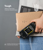 iPhone SE 2022 5G / SE 2020 / 8 Case | Fusion-X Design - Person holding a rugged black phone case and notebooks with military-grade protection text.