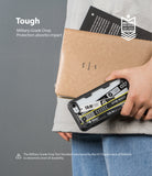 iPhone SE 2022 5G / SE 2020 / 8 Case | Fusion-X Design - Person holding a phone in a cassette-themed protective case.