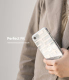 iPhone SE 2022 5G / SE 2020 Case | Fusion Design - Hand holding a clear phone case with white graphic text over an iPhone.
