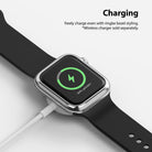 Apple Watch Series 6 / 5 / 4 / SE (40mm) | Bezel Styling - Apple Watch with silver bezel styling charging wirelessly.