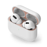 Ringke Airpods Pro Dust Guard Sticker - Open white charging case with rose gold metal dust guard and white earbuds.