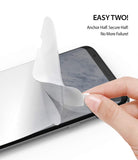 Galaxy S8 Plus Screen Protector | Dual Easy Film - Hand applying a protective film to a smartphone screen.
