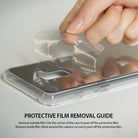 Galaxy S9 Case | Mirror - Silver - Hand peeling a clear protective film off the reflective back of a silver phone case.