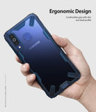 Galaxy M30 Case | Fusion-X - Hand holding a blue Samsung Galaxy M30 in a rugged, transparent Fusion-X protective case.