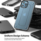 iPhone 12 / 12 Pro Case | [UX] - A blue translucent phone case with corner pegs resting on a stack of black protective cases.