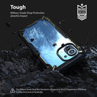 Mi 11 Case | Fusion-X - A rugged black and clear phone case resting on dark, textured rock with debris flying around it.