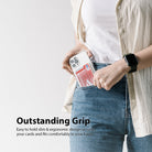 Card Holder | Magnetic Slot - Person holding a clear phone case with a credit card in a magnetic slot, tucked into a pocket.