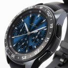 Galaxy Watch (42mm) | Bezel Styling - Black metal tachymeter bezel ring attached to a smartwatch with a blue dial.